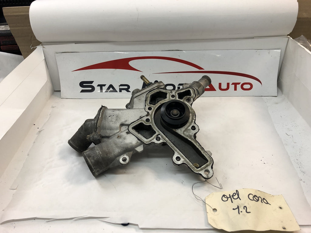 BLOC POMPE A EAUX OPEL CORSA C 1.2 ESSENCE ANNEE 2005