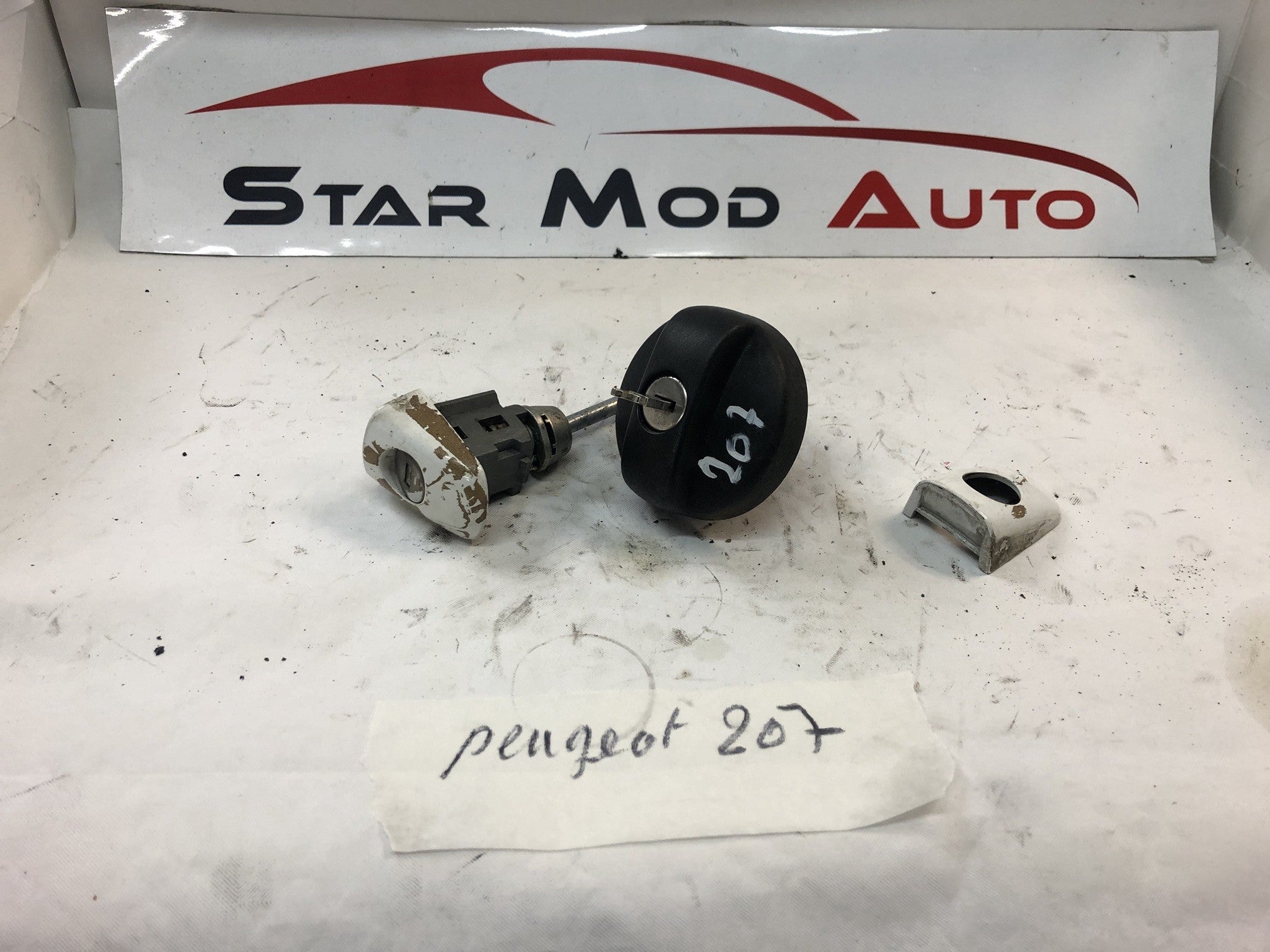 BARRIEZ DE PORTE  PLUS BOUCHON DE GASOIL PEUGEOT 207