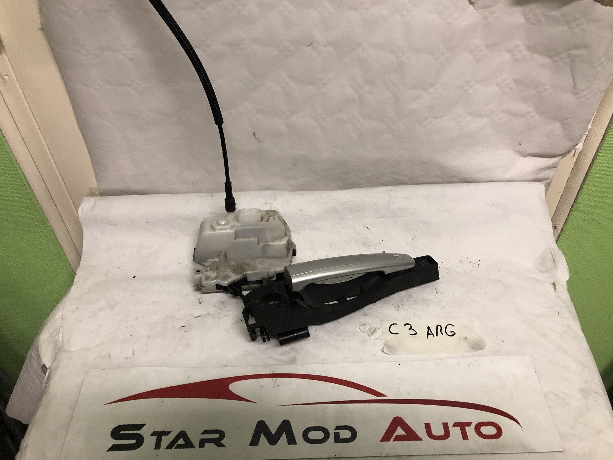 serrure de porte avant gauche Citroën c3 année 2006