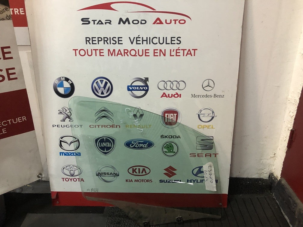 glace de porte avant droit Citroën c3 année 2014